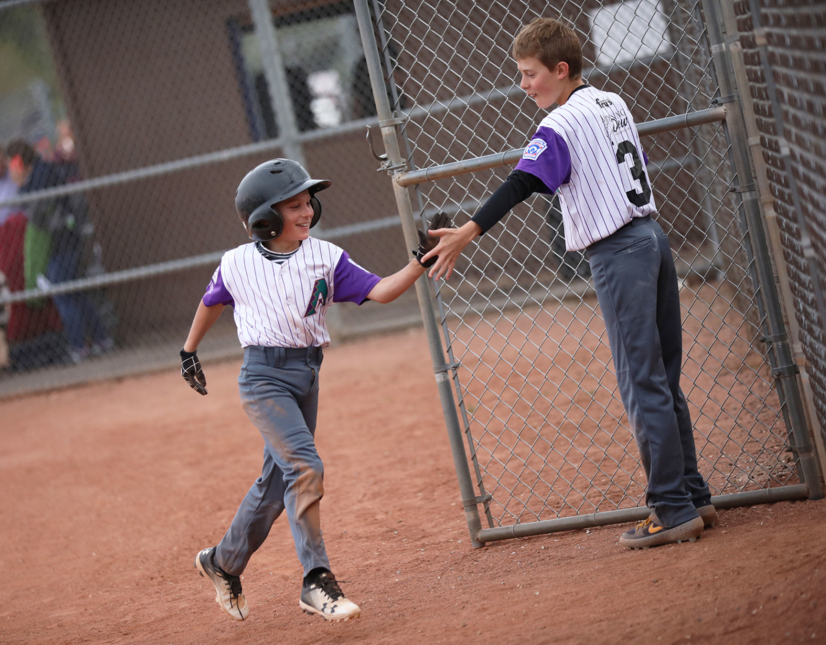 Smiling Into The Dugout